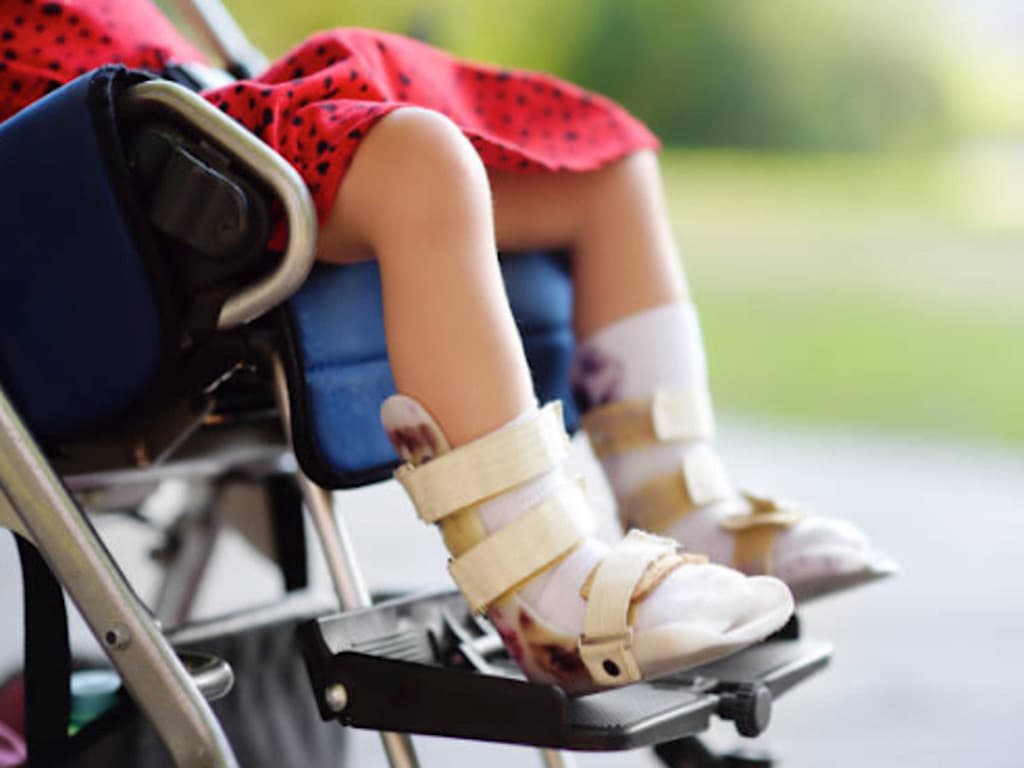 Vis et Deviens - Enfant malade sur un fauteuil roulant